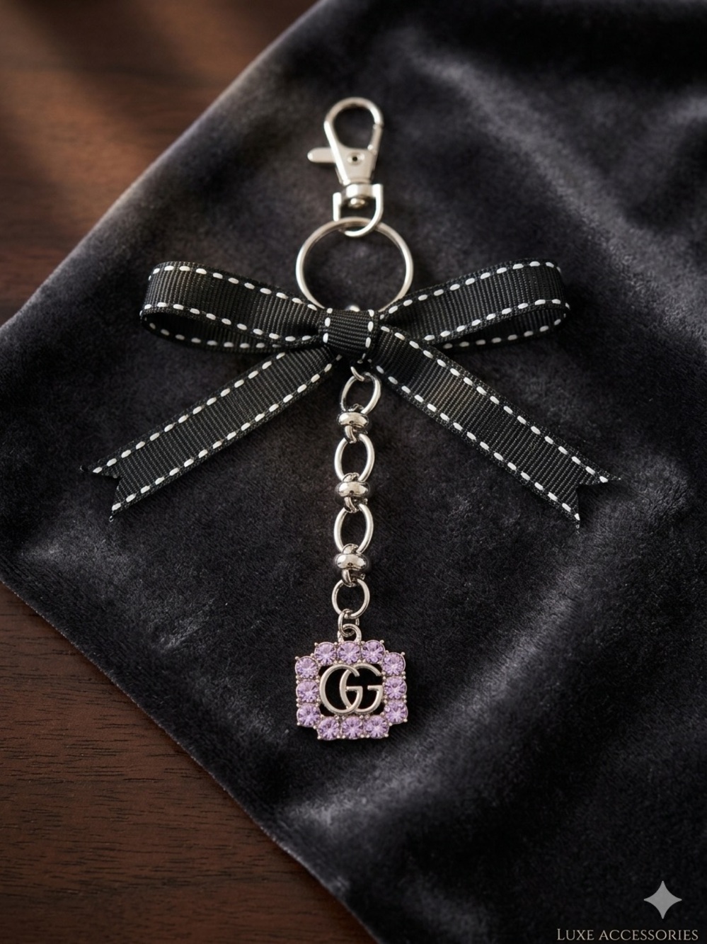 Silver Tone with Purple Crystal GG Charm Keychain with Black Bow